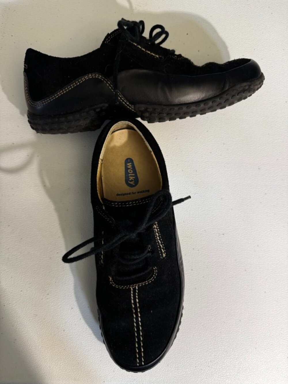Black suede lace-up Wolky's with white stitching